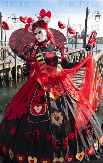Woman in carnival constume and mask on carnival in Venice