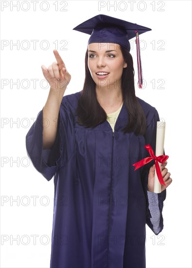 Young female graduate with diploma pushing button or pointing isolated on white