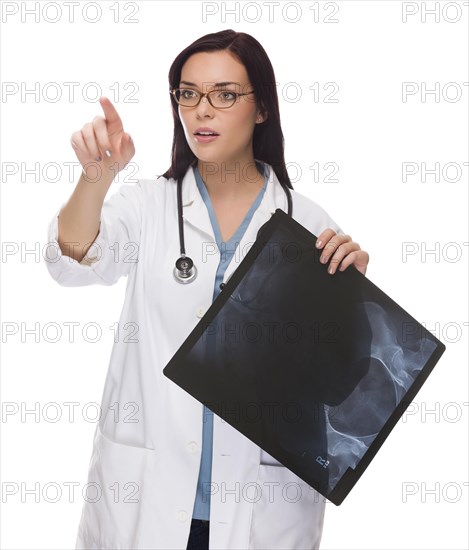 Female doctor or nurse with x-ray pushing button or pointing with room for your own button or text isolated on white