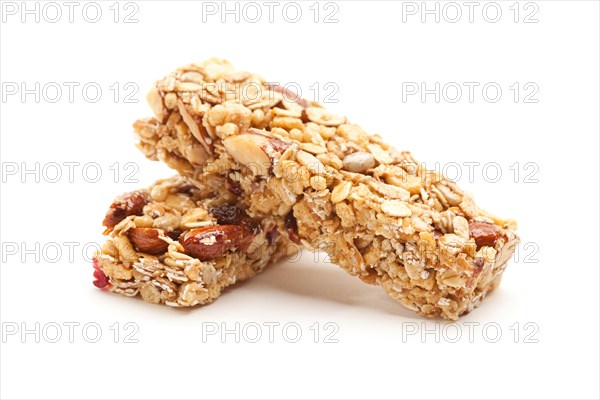 Two nutritious granola bars isolated on white