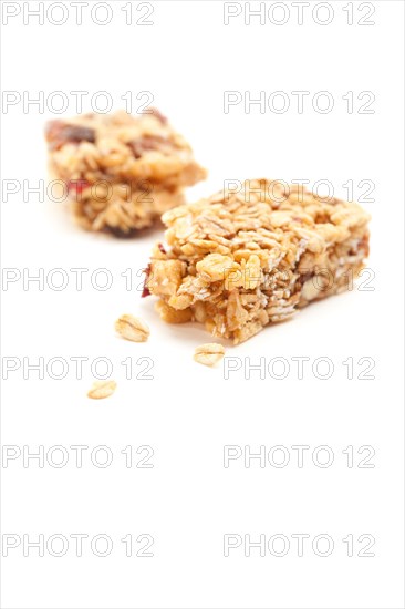 Broken granola bar isolated on a white background