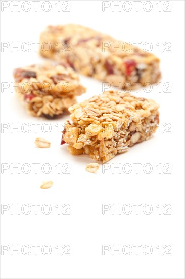 Broken granola bar isolated on a white background