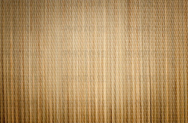 Bamboo mat background image with vignette ready for your own text