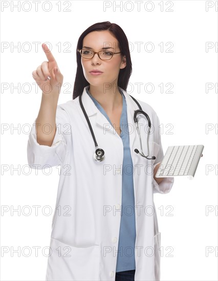 Female doctor or nurse with wireless keyboard pushing button or pointing