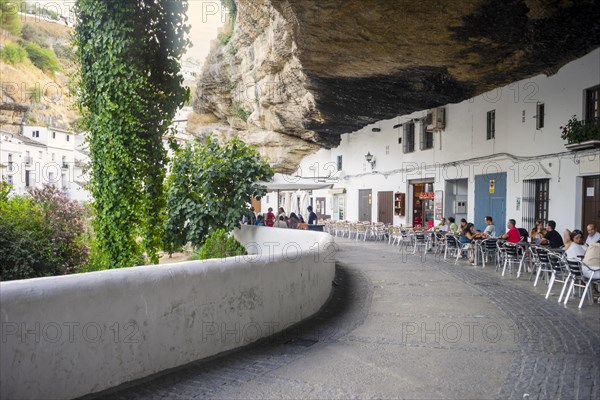 White washed houses built under the rock in Setenil de las Bodegas