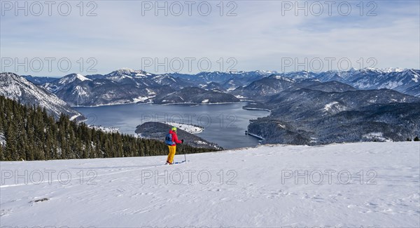Young woman on ski tour