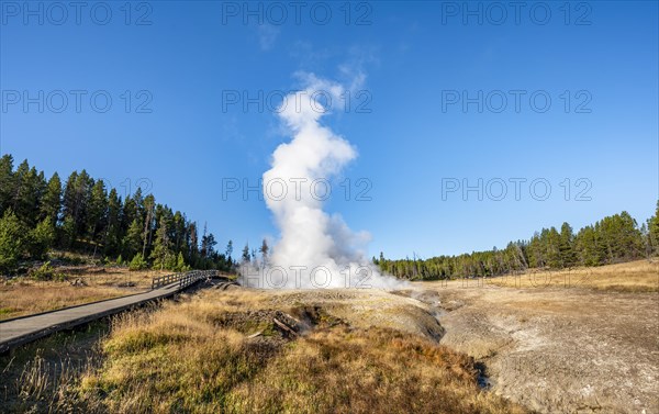 Footbridge next to steaming hot spring