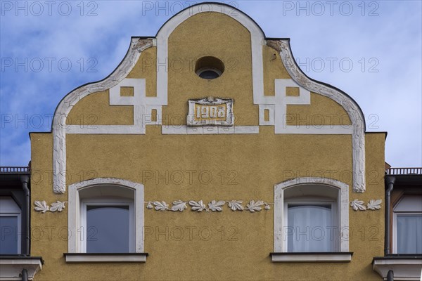 Art Nouveau relief on the gable of a residential house