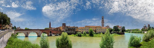 River Adige with city view and the stone bridge Ponte Pietra