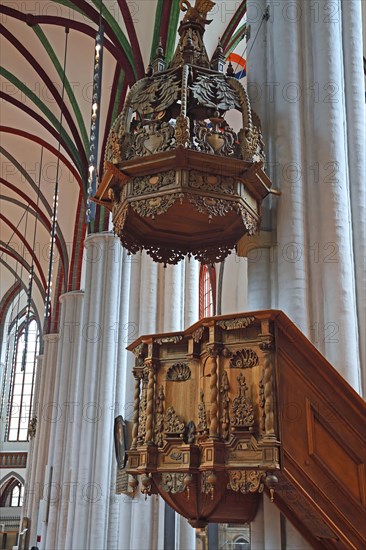 Carved pulpit in the renovated Nikolaikirche