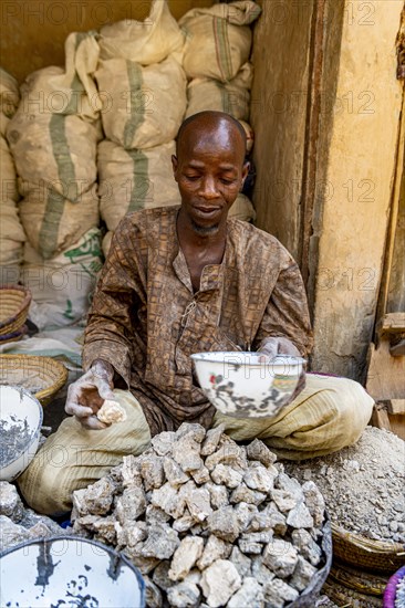 Man selling soapstones