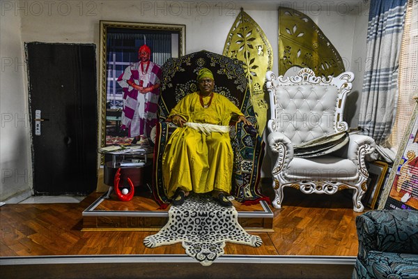 The king of Owo in his throne