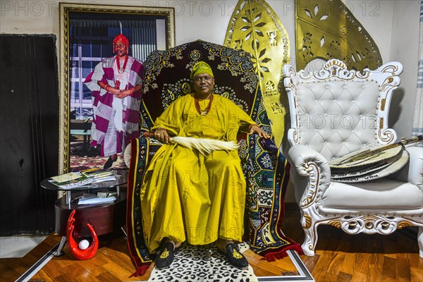 The king of Owo in his throne