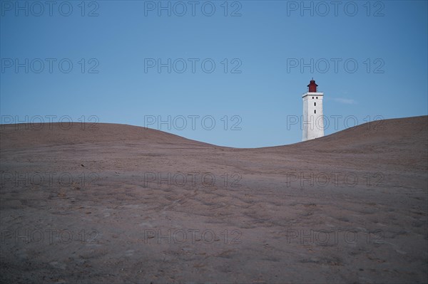 Dunes and lighthouse