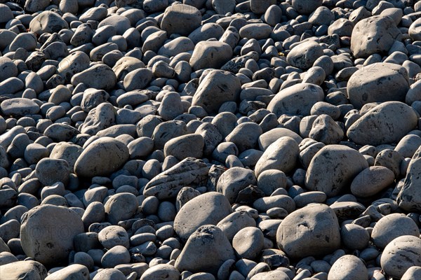 Rounded stones on the beach