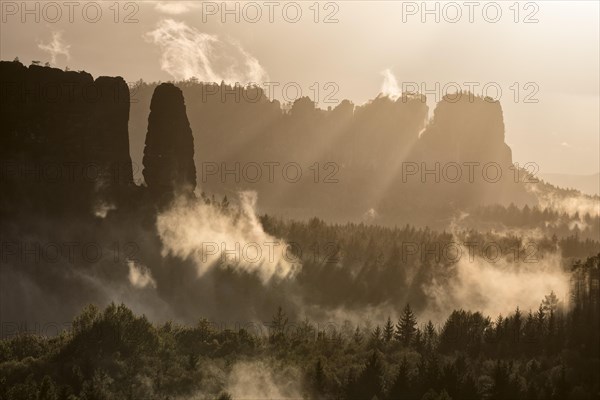 View from the cowshed to the Affensteine in the morning mist
