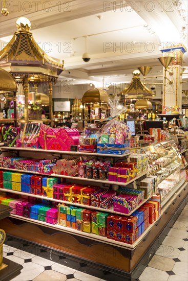 Sweets wrapped as gifts on a department store shelf