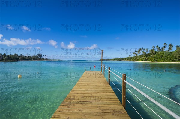 Pier in the turquoise waters of Muri beach