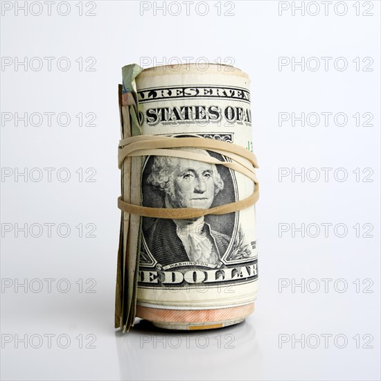 Roll of dollar banknotes