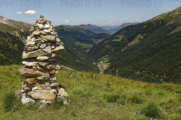 Cairns on mountain meadow