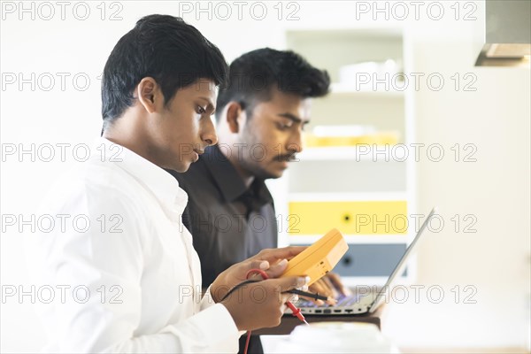 Students in an internship at the university with work equipment