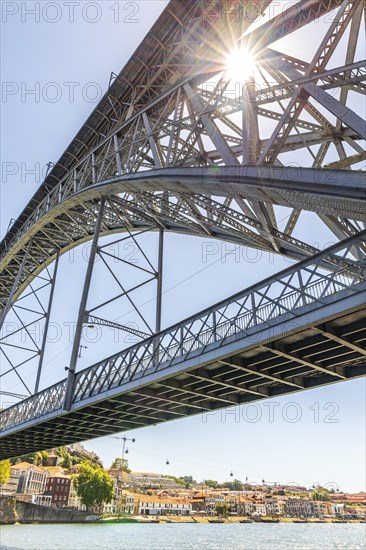 Beautiful iron Dom Luis I bridge over Douro river in Porto