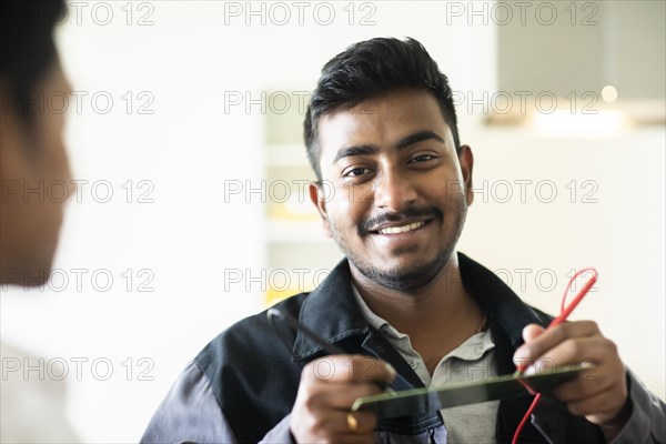 Students in an internship at the university with work equipment