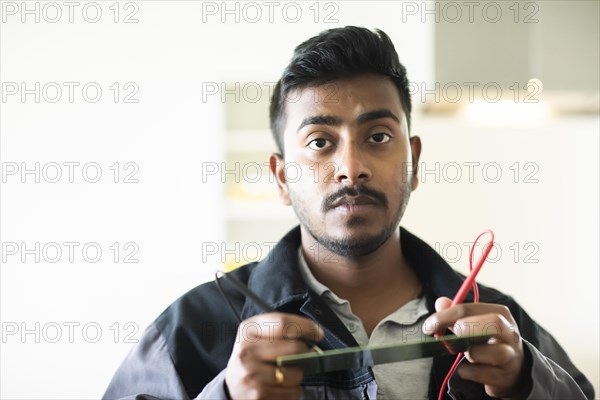 Student in an internship at the university with work equipment