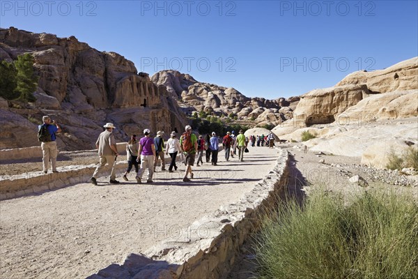 Tourists on their way to the Siq