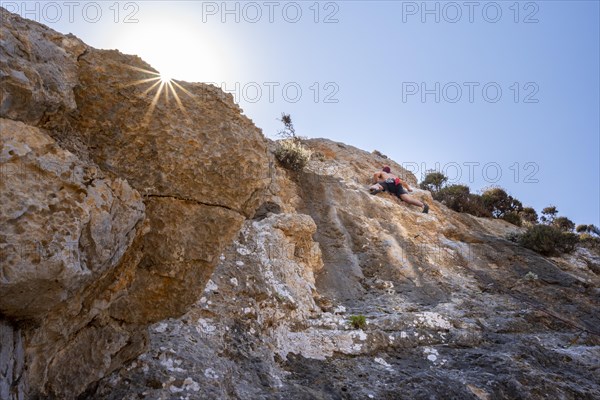 Climbing on a rock face