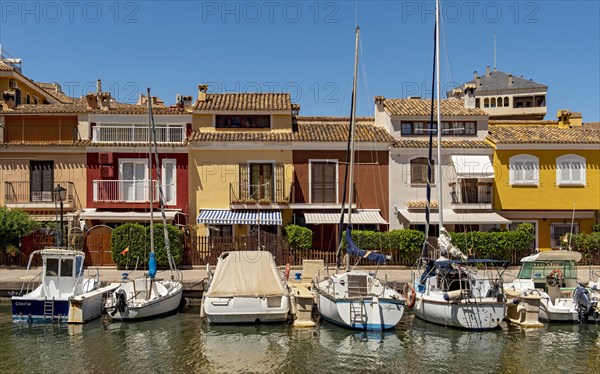 Yachts and colorful houses