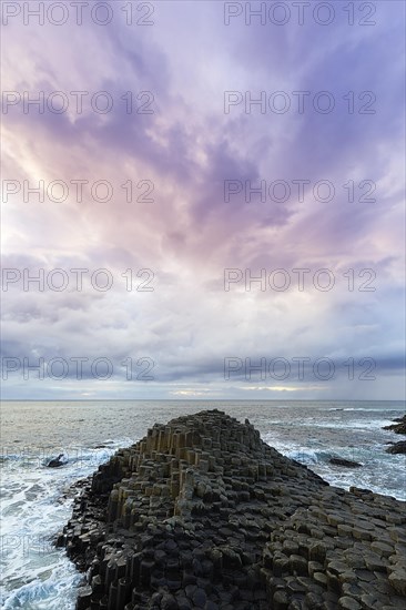 Coast with basalt columns in the evening