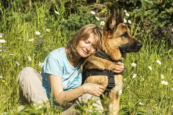 Woman and German Shepherd