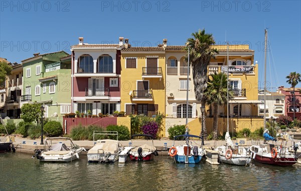 Yachts and colorful houses