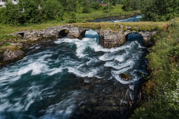 Stone bridge on the road to Briksdalsbreen