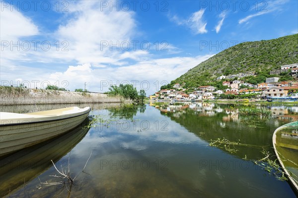 Small village reflected in the water