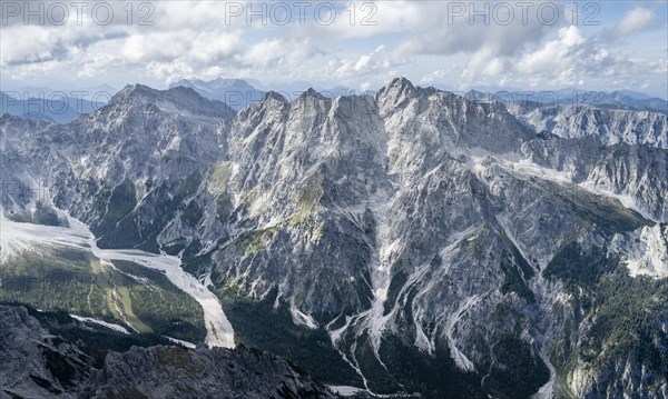 Hiker with helmet looking at mountains