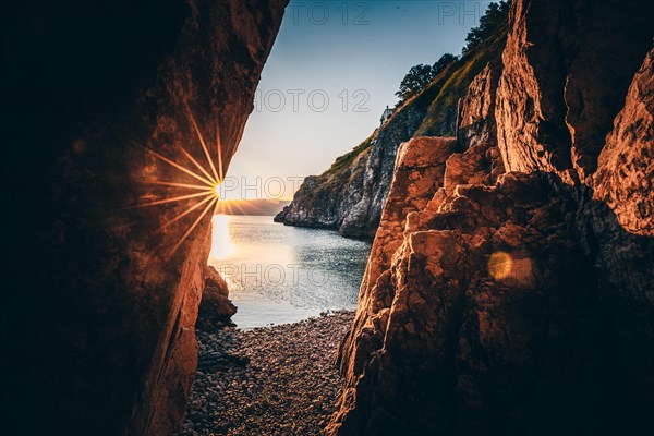 A small stone beach by the sea