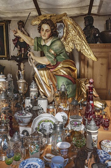 Glass and porcelain with angel figure