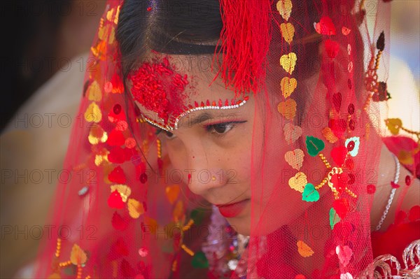 Nepalese bride from the Tharu ethnic group in traditional dress