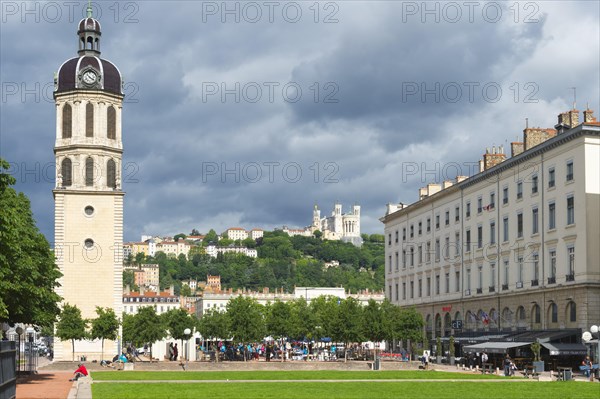 Bell tower of the former Hopital de la Charite and the Basilica Notre-Dame de Fourviere on the top of the hill