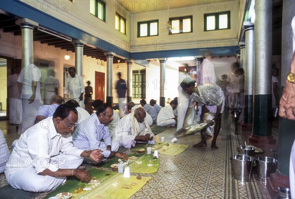A vegetarian banana leaf wedding break-fast dined in pandikattu Chettinad home dining hall. Nattukottai Chettiar Nagarathar community wedding