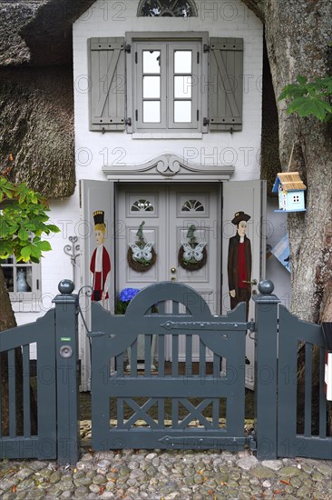 Artfully designed entrance to an old Frisian house