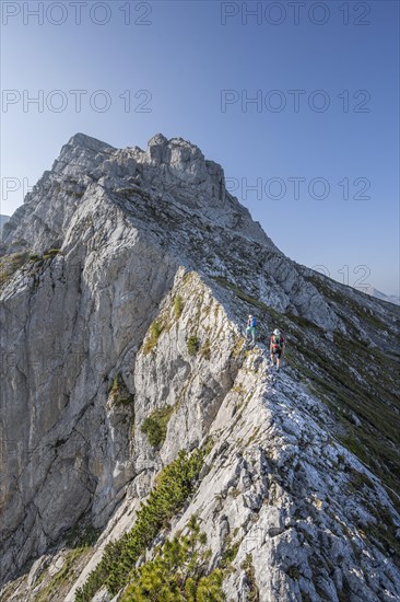 Hikers on a Grade