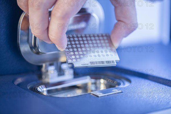 Inserting a multiple sample into a laboratory device