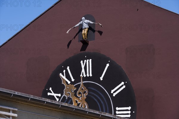 Clocks Graffiti with jumper figure