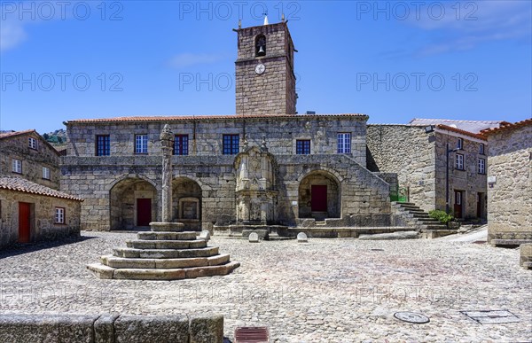 Main square with former city hall and bell tower