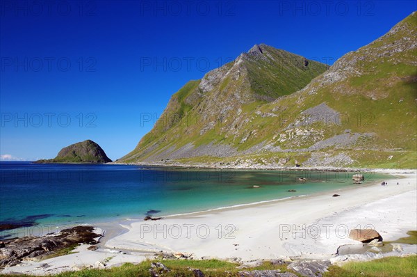 Wide sandy beach and crystal clear water