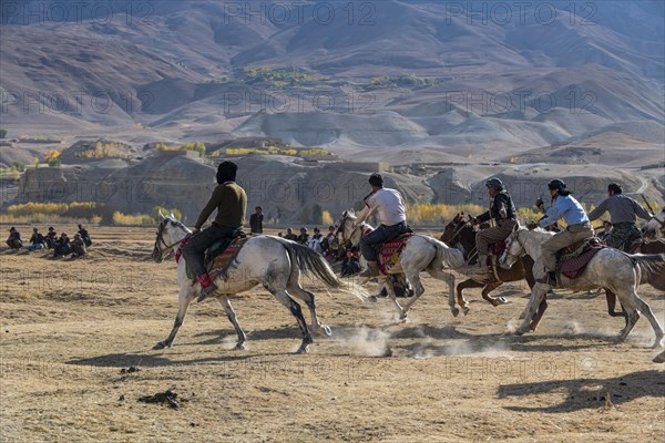 Men practising a traditional Buzkashi game