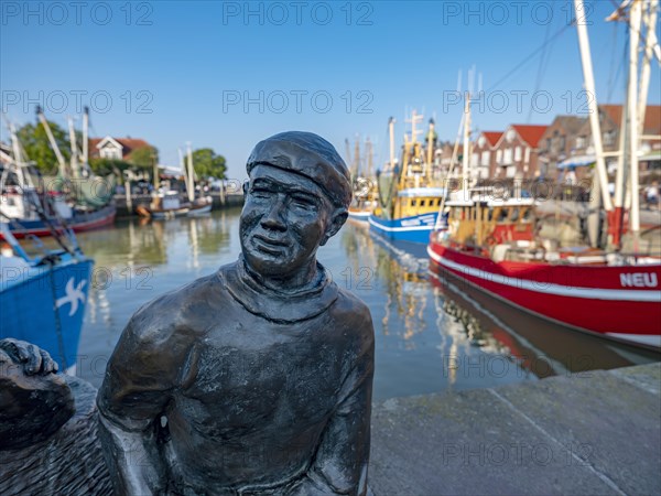 Bronze sculpture of a fisherman